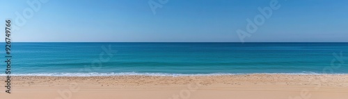 Labor Day outdoor nap on a beach, with a person resting on a towel under an umbrella, enjoying the sound of the waves