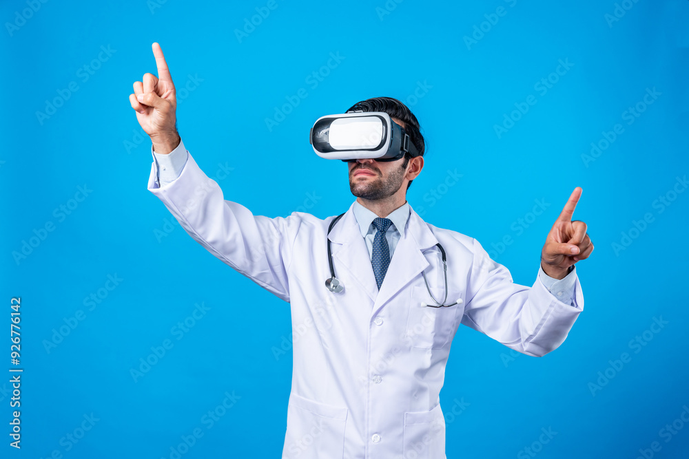 Caucasian doctor pointing and choosing medical data while standing. Handsome doctor wearing lab coat and VR goggles to connect metaverse or visual reality program. Technology innovation. Deviation. Caucasian doctor pointing and choosing medical data while standing. Handsome doctor wearing lab coat and VR goggles to connect metaverse or visual reality program. Technology innovation. Deviation.