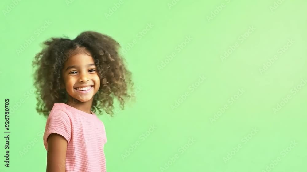 Young girl running and smiling on green screen background Young girl running and smiling on green screen background