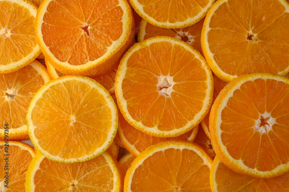 Citrus orange slices on the background. Healthy eating, diet and detoxification concept. Flat lay, top view Citrus orange slices on the background. Healthy eating, diet and detoxification concept. Flat lay, top view