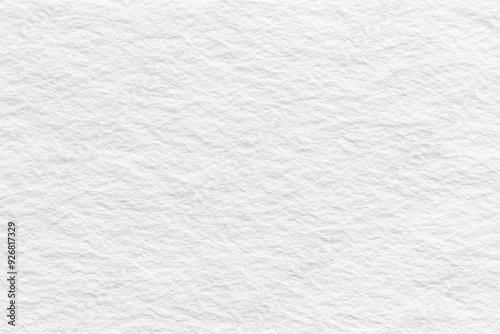 Close-up of seamless white watercolor paper texture background with subtle, natural patterns and a smooth finish. Ideal for creative projects requiring clean, artistic paper surfaces.