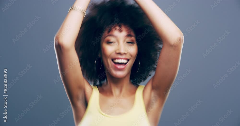 Face, dancing and black woman with celebration, afro and winning on a grey studio background. Portrait, African person and model with energy, excited and cheerful with achievement, success and smile Face, dancing and black woman with celebration, afro and winning on a grey studio background. Portrait, African person and model with energy, excited and cheerful with achievement, success and smile