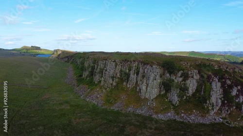 Aerial flight alongside the rocks photo