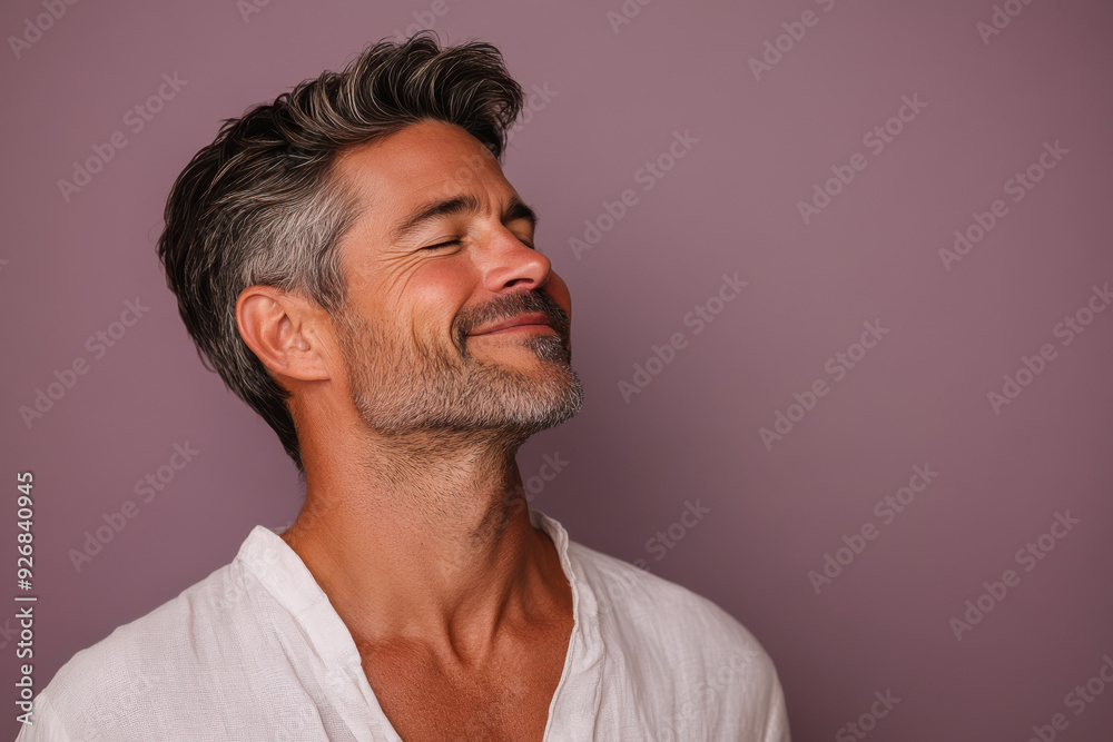 A close up of a man's face with her eyes closed A close up of a man's face with her eyes closed