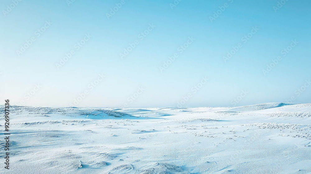 A vast, white, snow-covered landscape stretches out under a clear blue sky, punctuated by the faint trails of distant planes. A vast, white, snow-covered landscape stretches out under a clear blue sky, punctuated by the faint trails of distant planes.