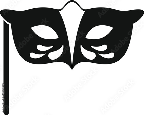 Black and white venetian carnival mask with a stick is waiting for the party to start