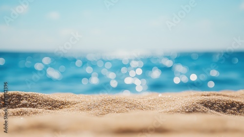 Stunning Summer Beach Scenery with Soft Bokeh, Sandy Shore, and Gentle Waves, Ideal for Vacation and Relaxation Posters, Ads, and Promotional Materials.