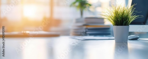 A clean and organized office desk with a computer, neatly arranged files, and a freshly wiped surface
