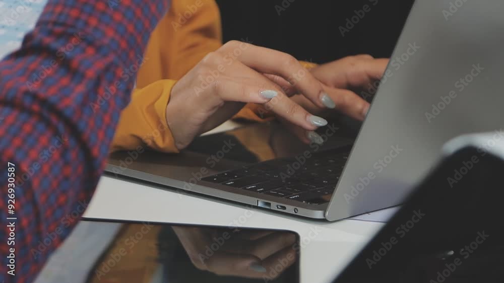 Financial analysts analyze business financial reports on a digital tablet planning investment project during a discussion at a meeting of corporate showing the results of their successful teamwork.