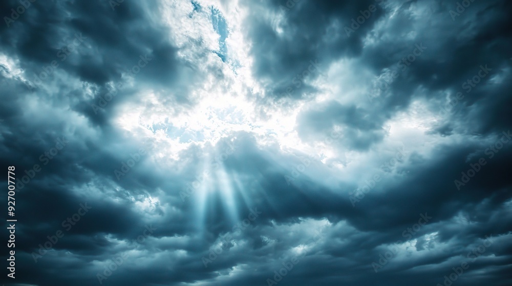 Obraz premium Heavenly Light Piercing Dark Clouds 