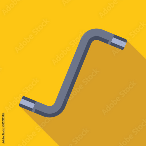 Allen key, also known as a hex key, is lying on a yellow background, casting a long shadow