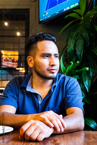 Person sitting in a cafe