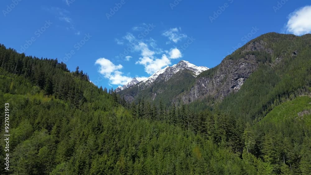 Canadian Mountain Landscape, Trees and Blue sky. British Columbia, Canada. Canadian Mountain Landscape, Trees and Blue sky. British Columbia, Canada.