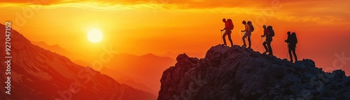 Hikers silhouette on mountain ridge during sunset, showcasing adventure, exploration, and breathtaking landscapes.