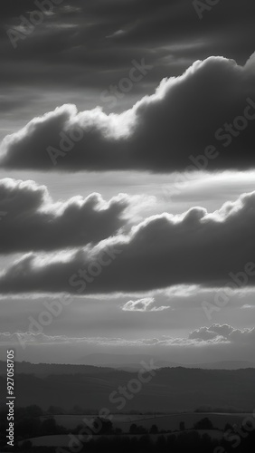 A black and white photo of a sky with clouds