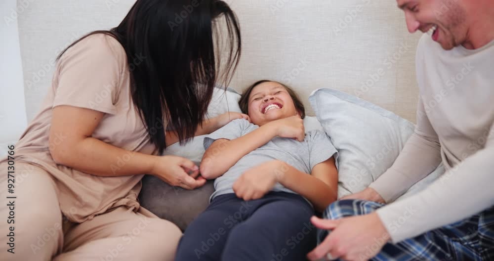 Happy, tickling and parents with child on bed at family home on a weekend morning together. Love, smile and young mother and father bonding, laughing and playing with girl kid in bedroom at house. Happy, tickling and parents with child on bed at family home on a weekend morning together. Love, smile and young mother and father bonding, laughing and playing with girl kid in bedroom at house.