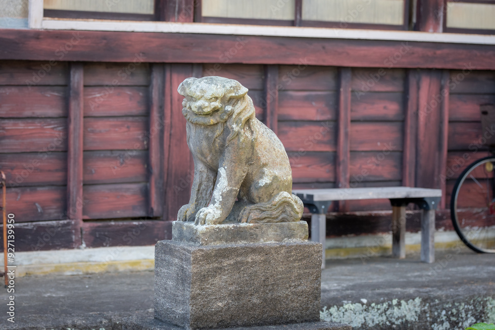 lion statue in front of a church lion statue in front of a church