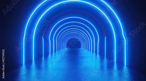 Neon blue arches illuminate a tunnel. This futuristic abstract photo is perfect for adding a vibrant touch to your designs.