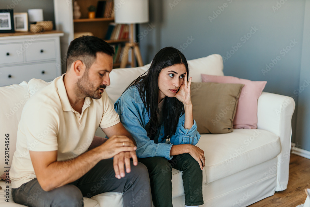 Fight, divorce and depression with couple on sofa for conflict, therapy and mental health or marriage counseling Fight, divorce and depression with couple on sofa for conflict, therapy and mental health or marriage counseling
