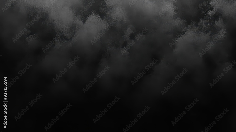 A dark, smoky texture background with soft cloud-like formations. A dark, smoky texture background with soft cloud-like formations.
