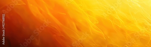 A close-up, abstract image of a vibrant orange and yellow gradient background. The texture is reminiscent of flowing water or clouds, with soft, subtle waves and swirls. The lighter yellow blends into