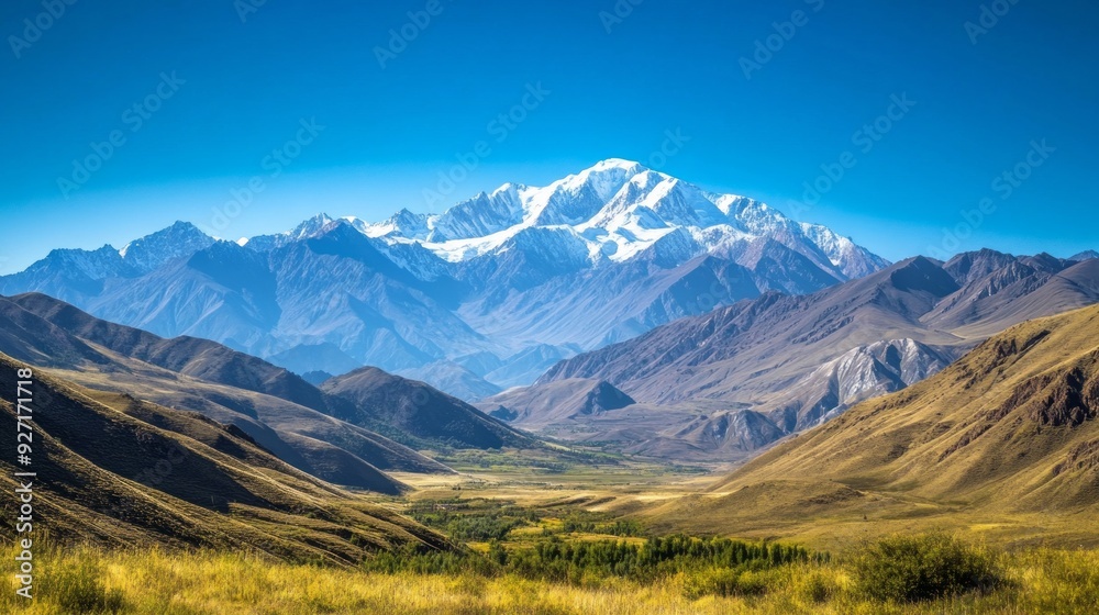 Majestic Snow-Capped Mountains Against a Clear Blue Sky Majestic Snow-Capped Mountains Against a Clear Blue Sky