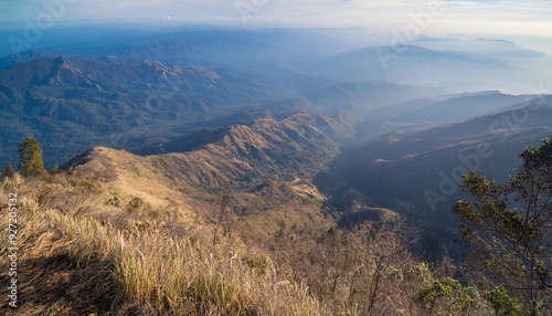 The mountains are surrounded by dense forests, presenting a green and lush view.. generative ai