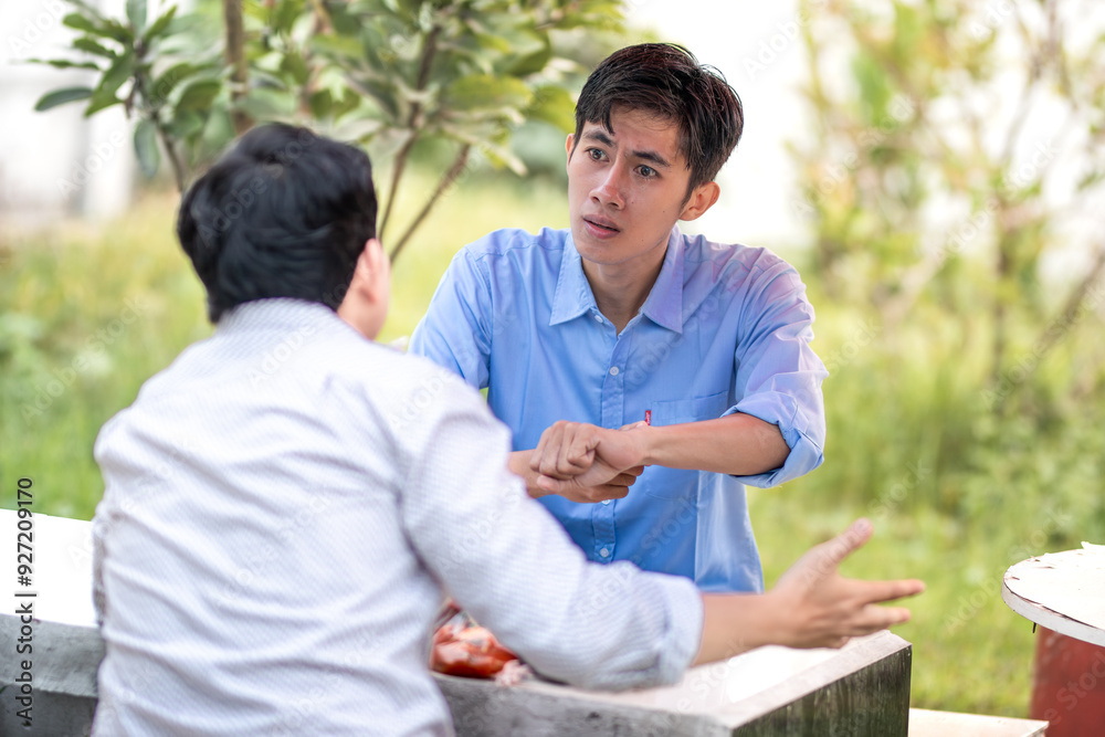 A guy scolds and blames someone for being late. Men getting scolded for being late. A guy scolds and blames someone for being late. Men getting scolded for being late.