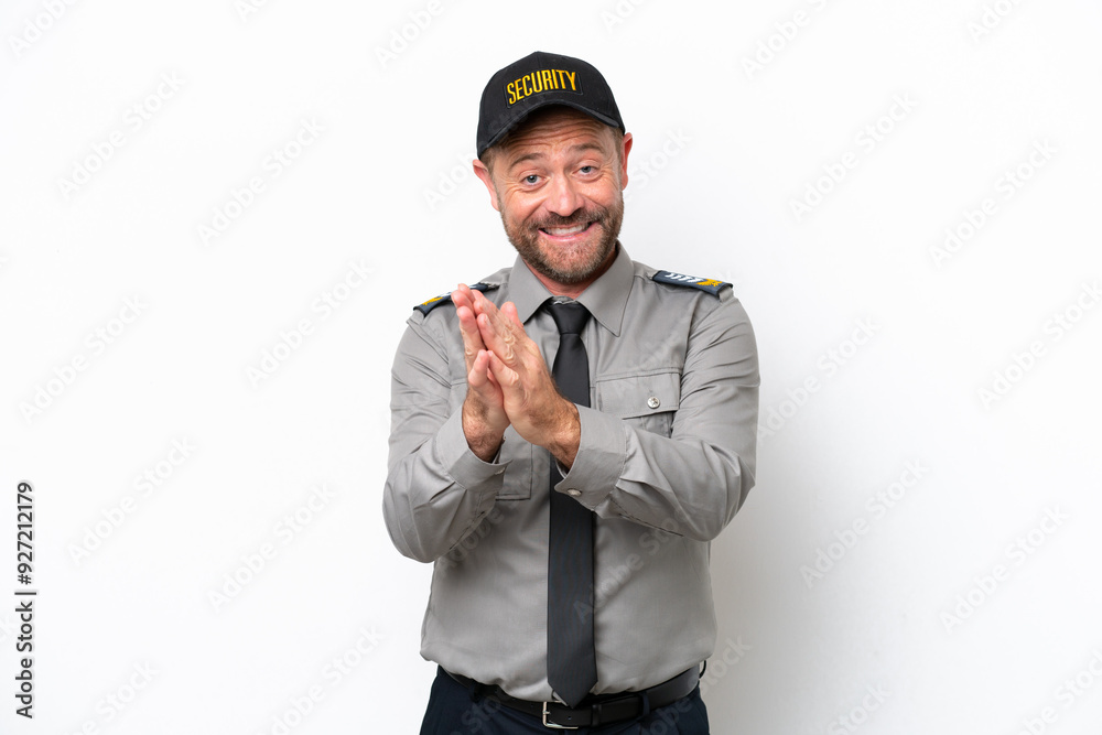 Middle age security man isolated on white background applauding after presentation in a conference Middle age security man isolated on white background applauding after presentation in a conference