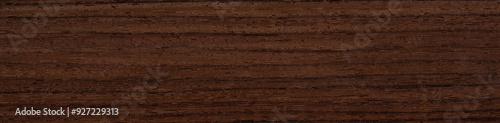 Rosewood veneer surface with rich, dark streaks and elegant wood patterns photo