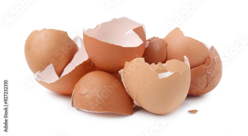 Pile of broken eggshells isolated on white