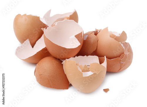 Pile of broken eggshells isolated on white