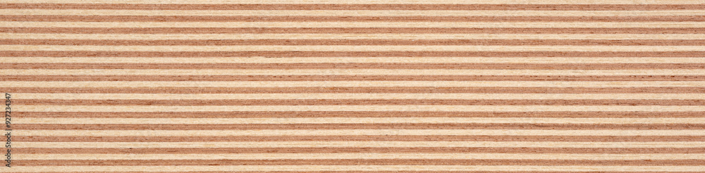 Fototapeta premium Parallel sandy brown and white lines offer a textured veneer pattern