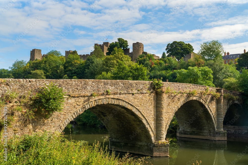 Dinham bridge over the River Teme with Ludlow castle behind in the town of Ludlow, Shropshire UK in Landscape orientation Dinham bridge over the River Teme with Ludlow castle behind in the town of Ludlow, Shropshire UK in Landscape orientation