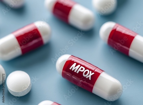 Red "MPOX" Pills Among White Ones, Background with the Inscription