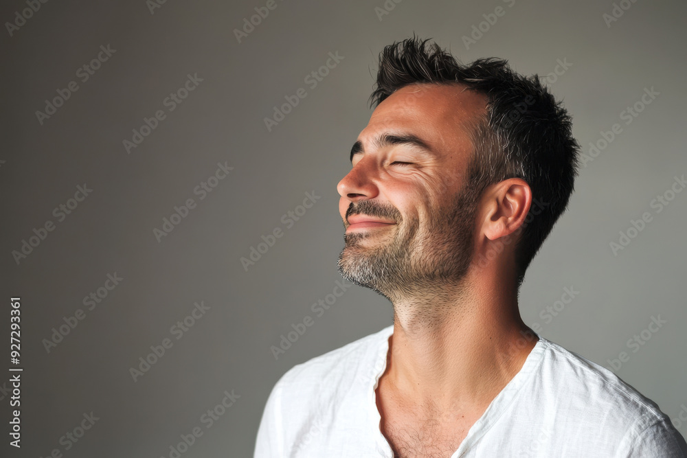 A close up of a man's face with her eyes closed A close up of a man's face with her eyes closed