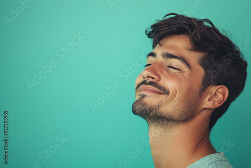 A close up of a man's face with her eyes closed