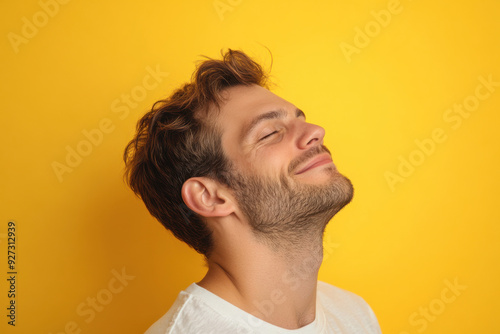 A close up of a man's face with her eyes closed