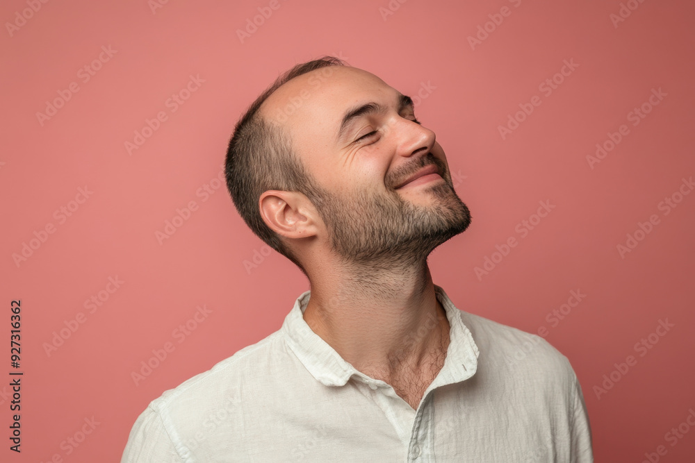 Fototapeta premium A close up of a man's face with her eyes closed