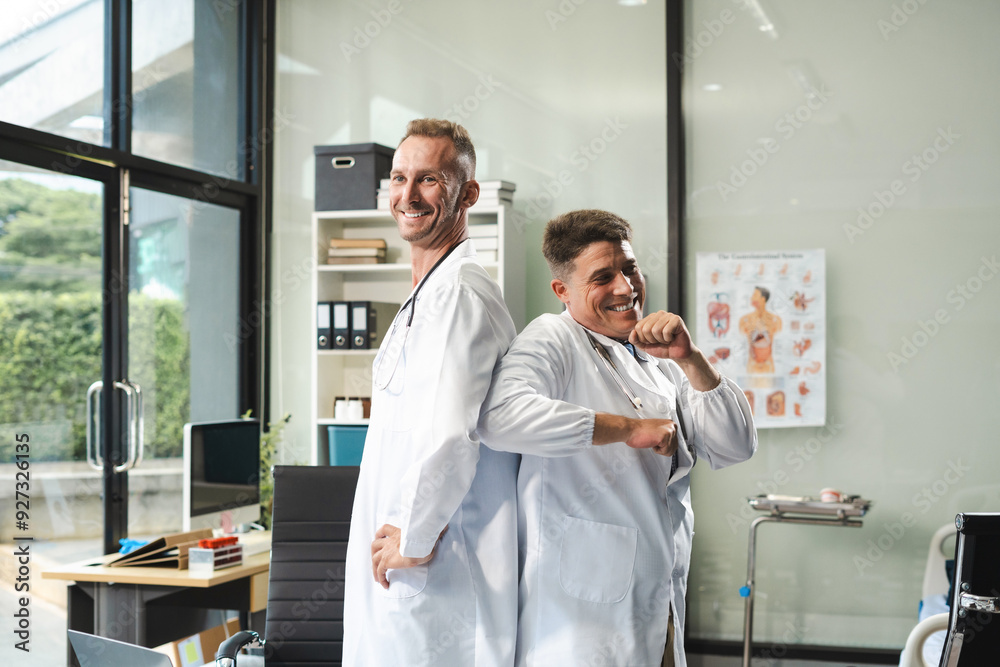 Successful medical team thumbs up to show success and motivation. Successful medical team thumbs up to show success and motivation.