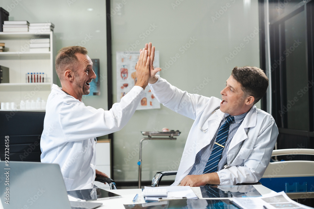 Successful medical team thumbs up to show success and motivation. Successful medical team thumbs up to show success and motivation.