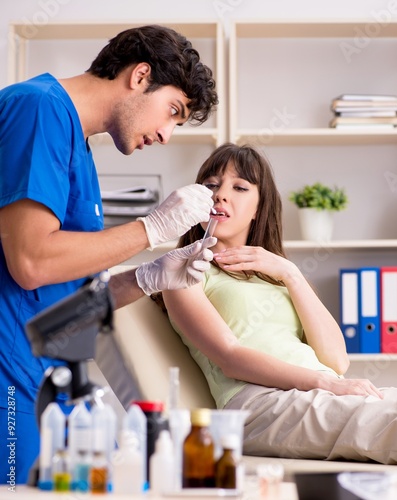 Obraz na płótnie Doctor getting saliva test sample in clinic hospital w salonie