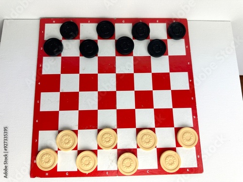 checkers on a chessboard. photo