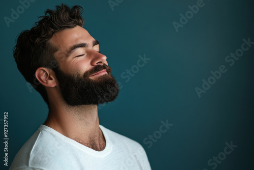 A close up of a man's face with her eyes closed