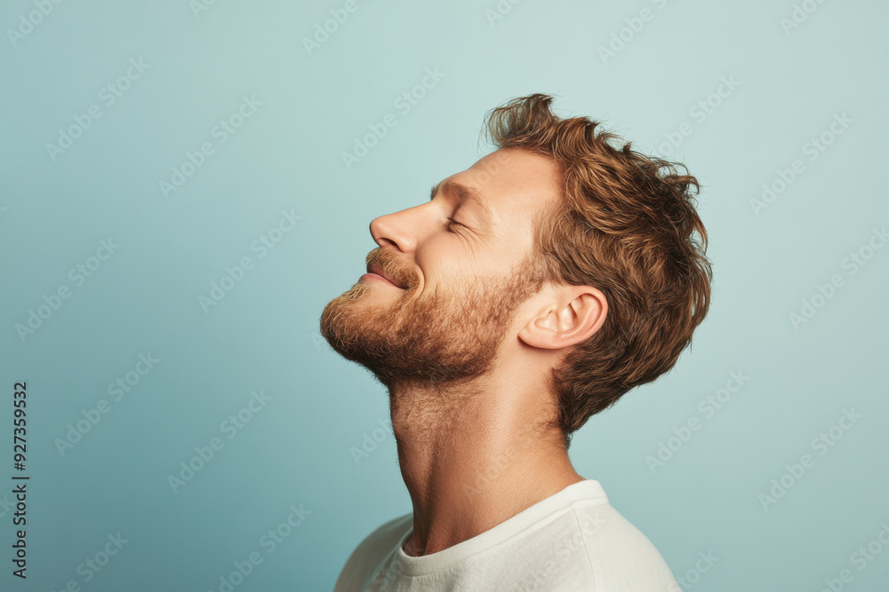 Fototapeta premium A close up of a man's face with her eyes closed