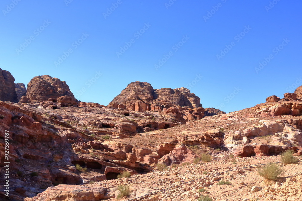 Fototapeta premium footpath in the rock along Ad-Deir Trail Monastery Route in the historic and archaeological city of Petra, Jordan