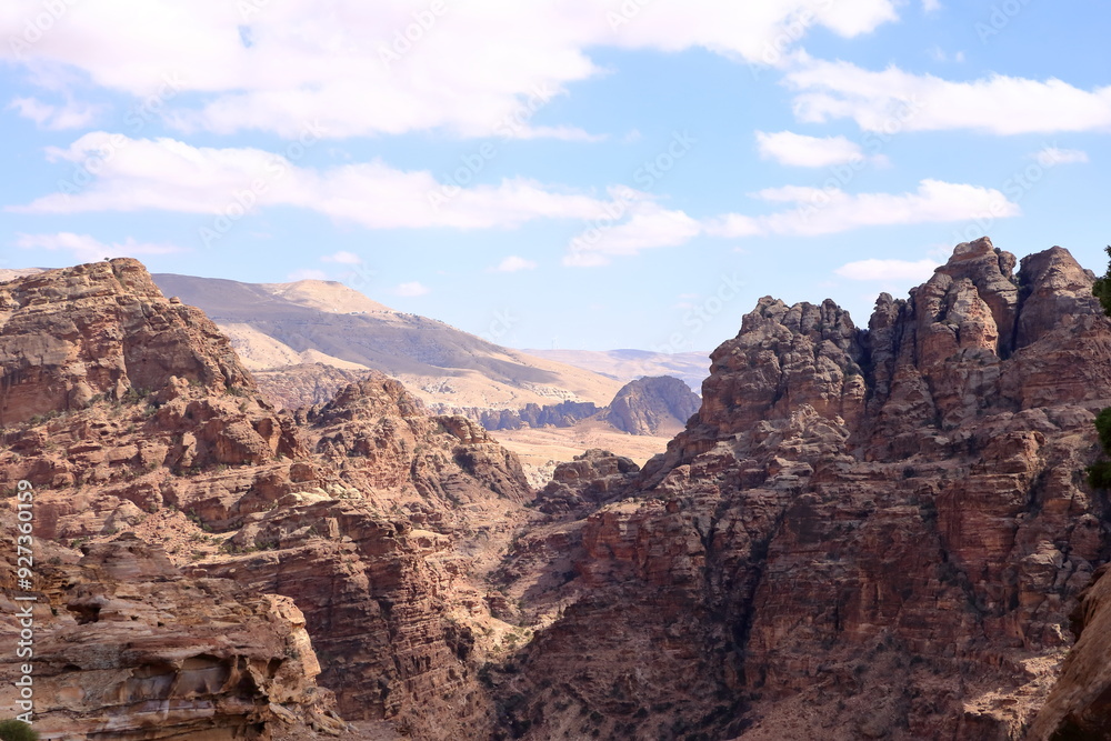 Obraz premium Scenic landscape view from the Ad-Deir Trail Monastery Route in the historic and archaeological city of Petra, Jordan