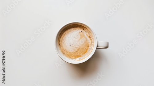 White coffee cup brimming with steaming hot coffee on a clean background, promising a delightful morning pick-me-up. Enjoy the visual appeal of this classic coffee moment