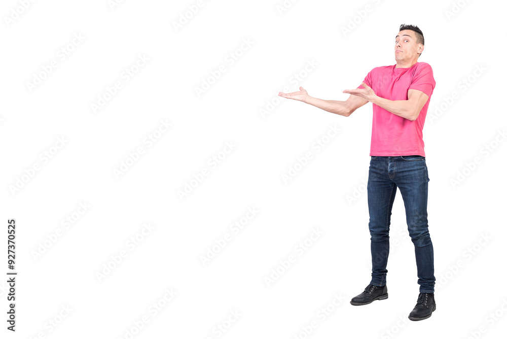 Uncertain man pointing aside in studio. White background Uncertain man pointing aside in studio. White background