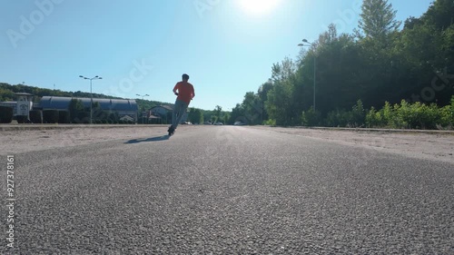 Wallpaper Mural Slalom on an electric scooter on asphalt in slow motion
 Torontodigital.ca